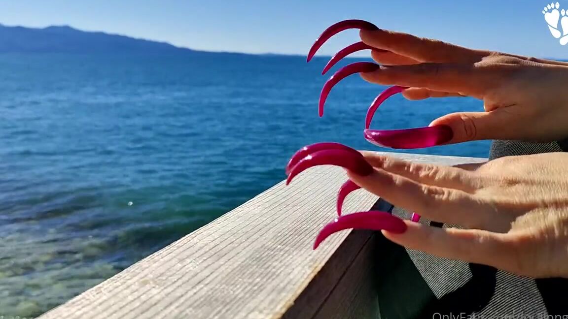 Lora Long Nails Nicknamed Loralongnails Onlyfans Long Red Nails And The Sound Of The Sea