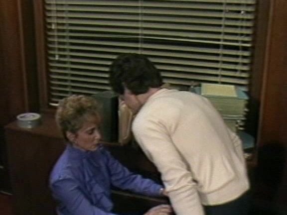 "Cassandra Leigh, Chelsea Blake, Honey Wilder, Karen Jeffries, Robin Everett, Sharon Kane, Bobby Astyr, Eric Edwards, George Payne, R. Bolla." Classic, Stockings, Straight, Mature Bunny's Office Fantasies VCA