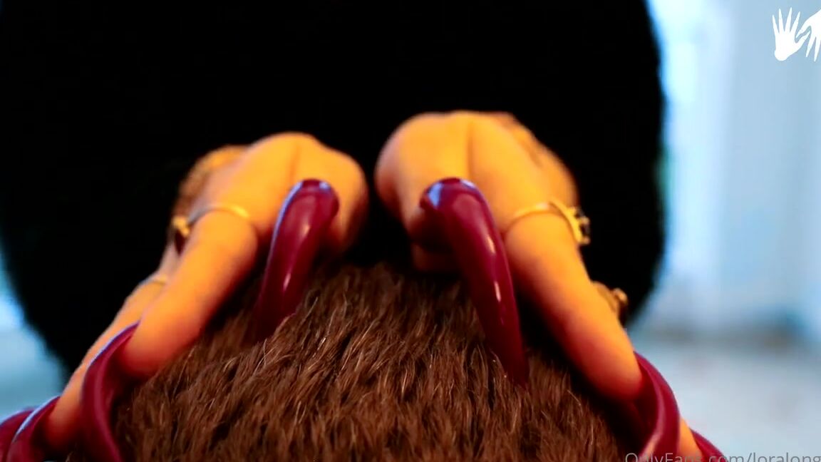 Lora Long Nails Nicknamed Loralongnails Onlyfans Combing The Head With Long Red Nails