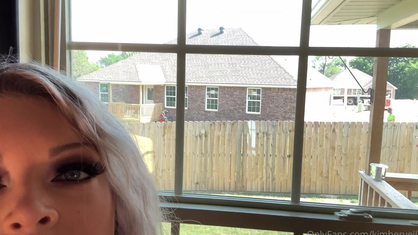 Kimberveilsplus Stripping In Front Of The Window With Some Construction