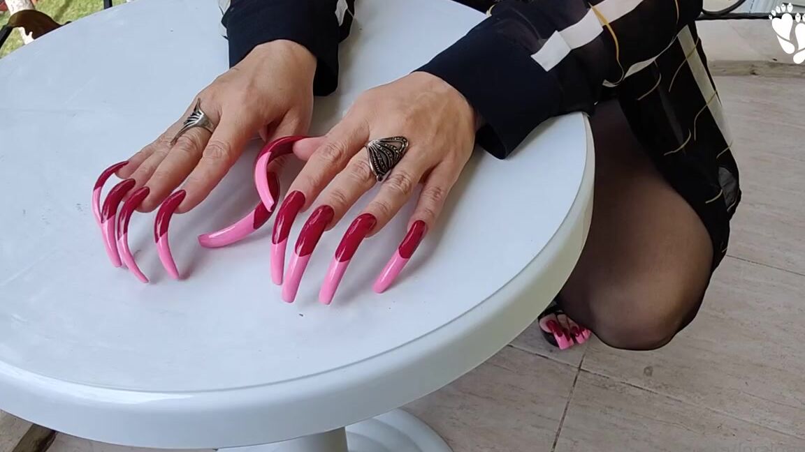 Lora Long Nails Nicknamed Loralongnails Onlyfans High Heels And Tights On The Balcony