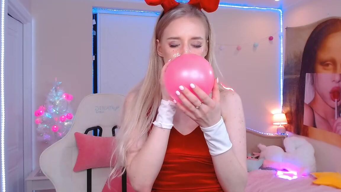 Jane Klein Blowing Pink Balloon Till Bust