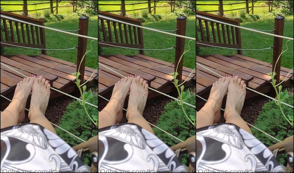 Kasysnowpremium Bouncing My Bare Feet On Clothesline Outside And Shaking A Plant