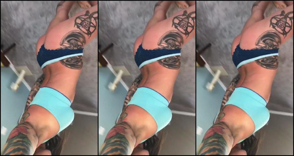 Felicity Feline Teasing With Clothes On