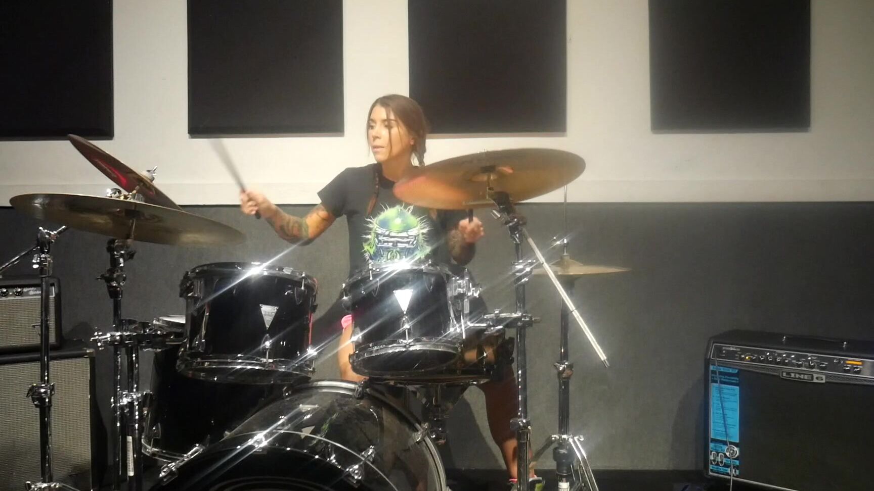 Felicity Feline Drums Some Hard Rock