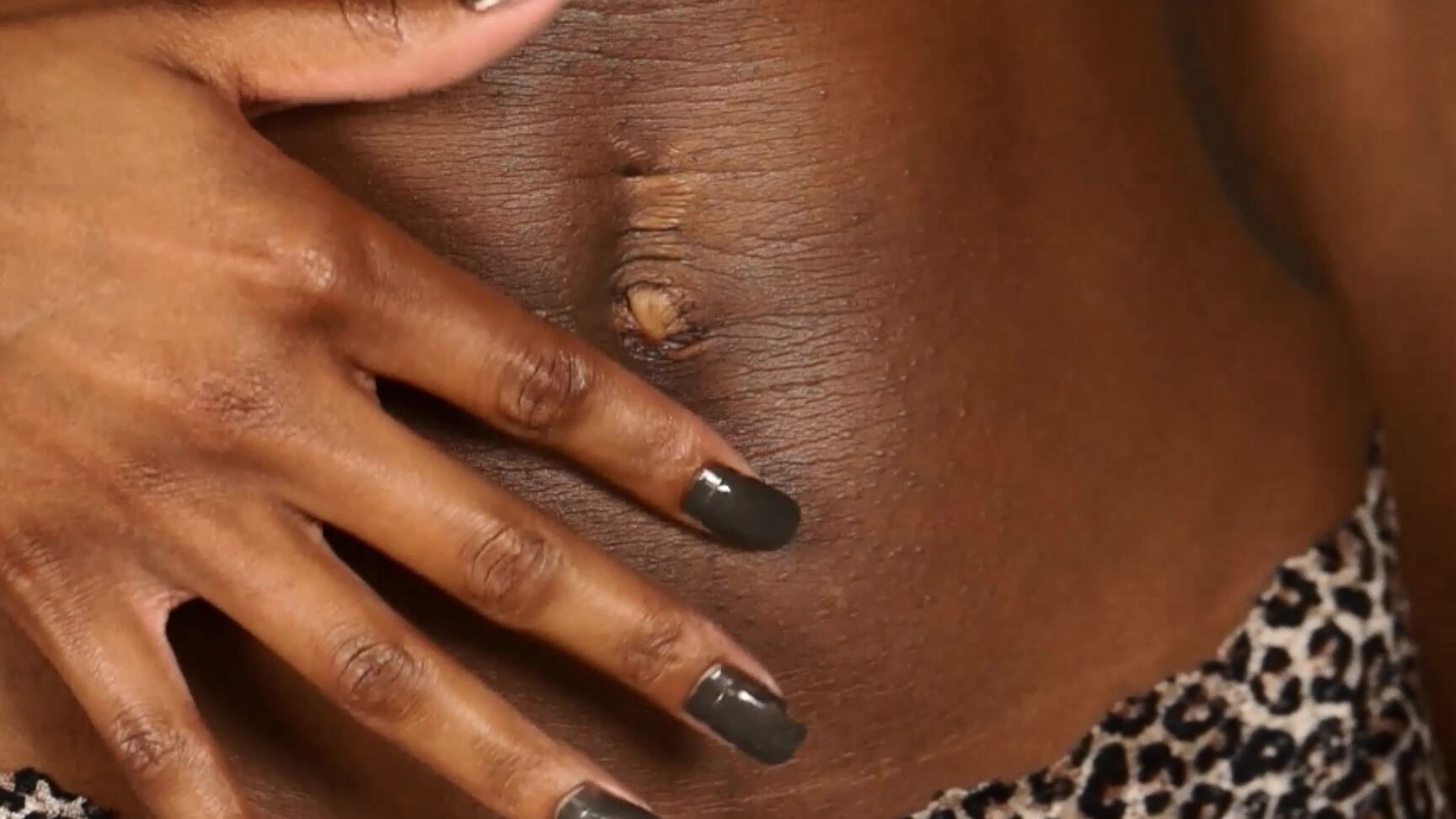 Halle Shows Off Her Belly Button