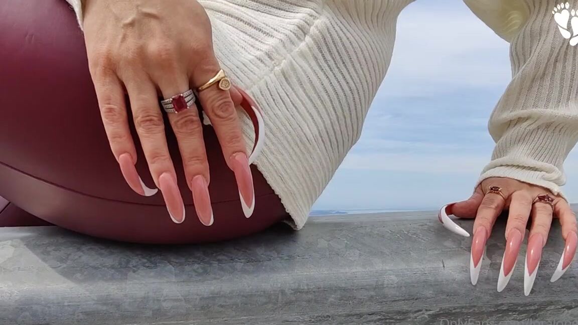 Lora Long Nails Nicknamed Loralongnails Onlyfans Im Sitting On A Roadside Barrier High Up In The Mountains Overlooking The City Wearing Burgundy