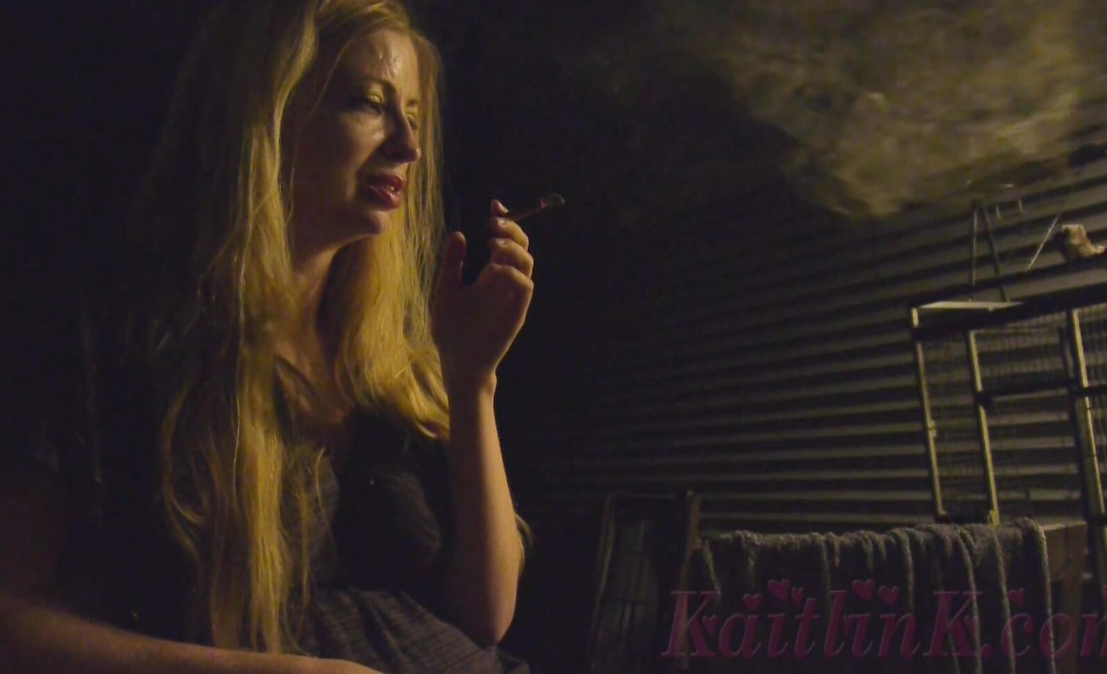 Kaitlink Smoking A Cigarillo At Night