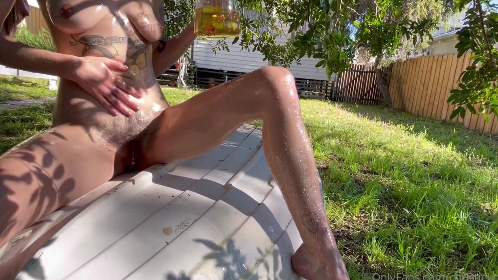 cultofkosmo-09-11-2021-2269927841-sleek-slippery-oil-with-gold-flakes-on-a-boat-in-the-sun-lots-of-fun