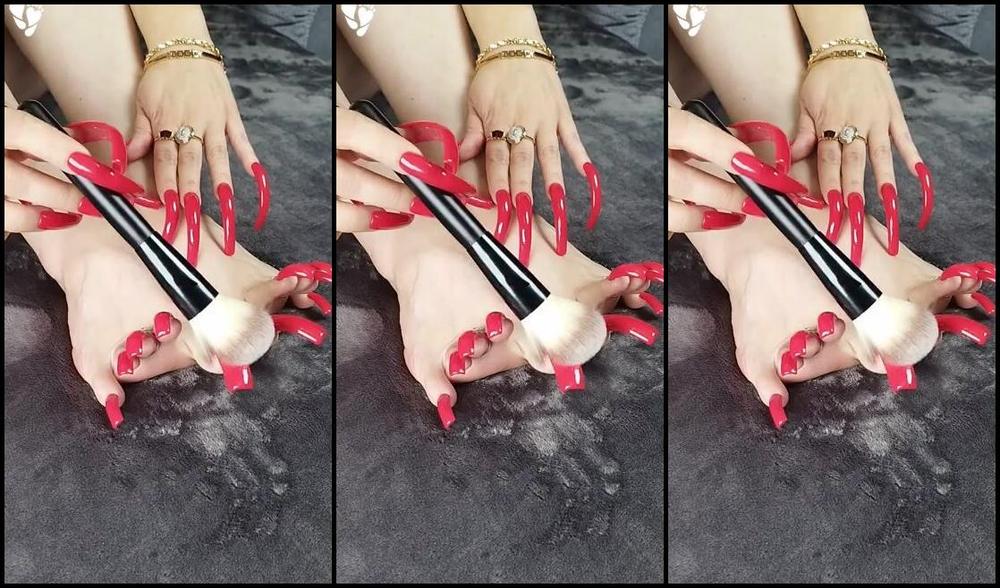 Lora Long Nails Nicknamed Loralongnails Onlyfans I Caress My Legs And Nails With A Brush