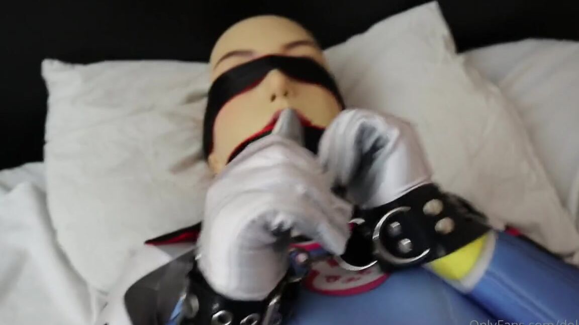Dollified Nicknamed Dollified Onlyfans Part Two A Blindfolded And Gagged Sky Encased In Silicone Mask And Skintight Dva Plugsuit And