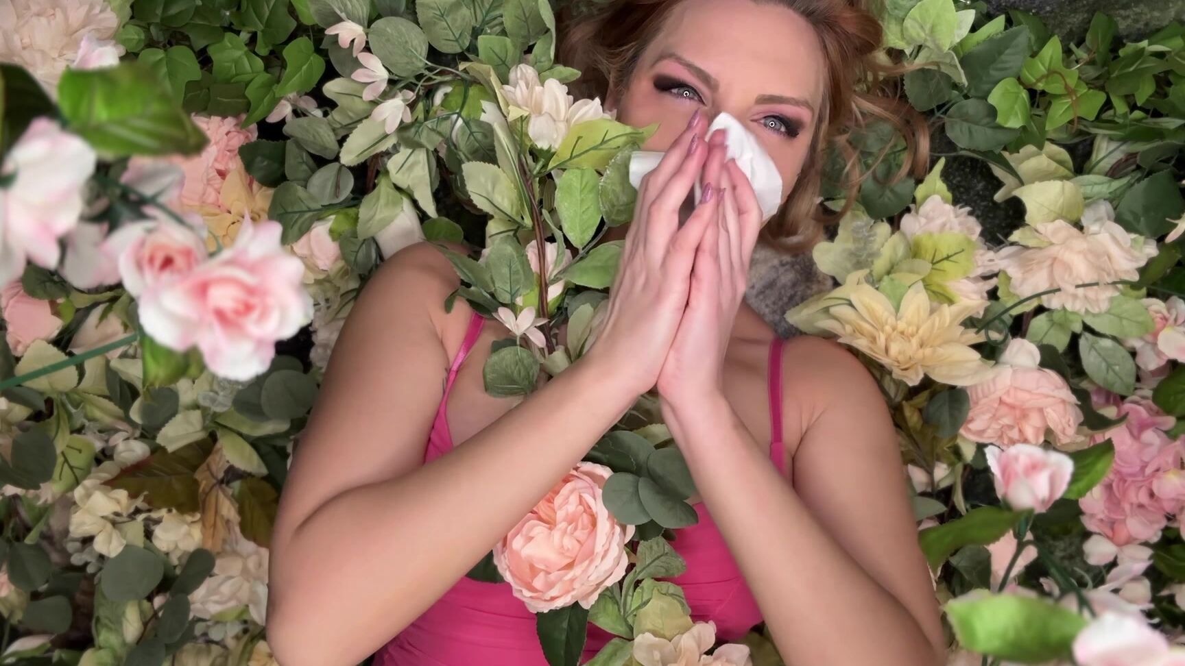 "SneezeGoddess" florist, mucophilia, noseblowing, nosepinching, redhead, sfw, sneezegoddess, sneezing Sneezing and Honking Lying in Flowers manyvids