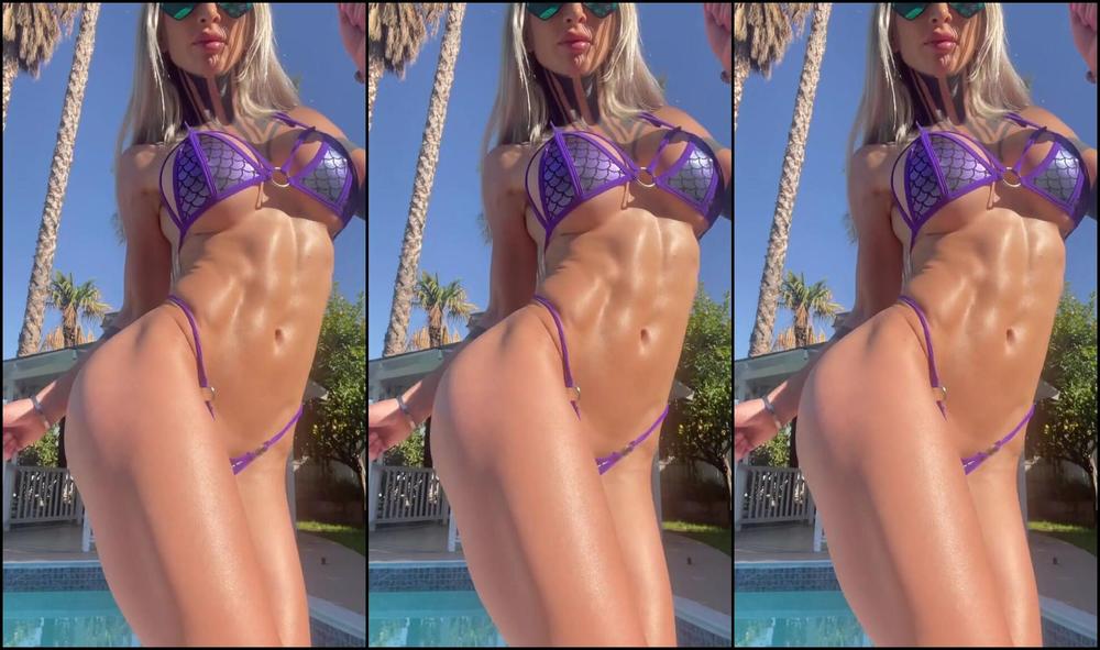 Katopunk Sexy Purple Bikini strips & teases in a katopunk video