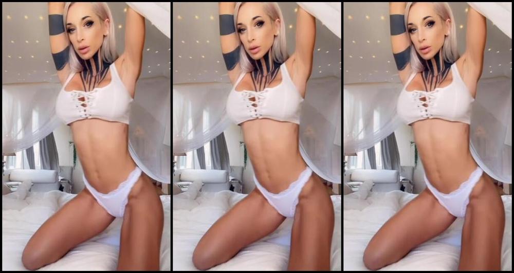 KatoPunk strips, stretches & teases with tattoos and blonde hair