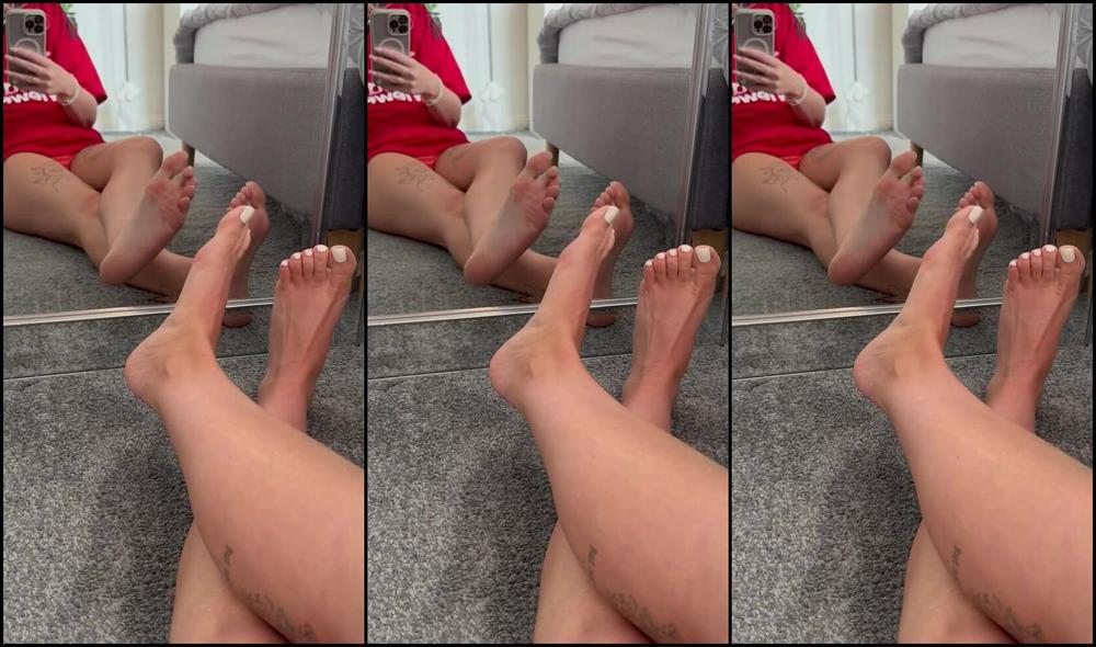 Emily Walters dominates and teases her sub with her sexy toes