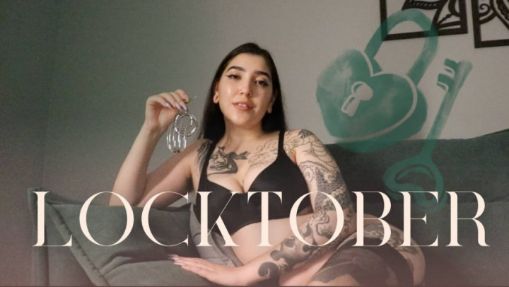 Poster for Locktober Intro By Devillish Goddess Ileana - Manyvids Girl - Devillishgoddess - Bigboobs, Tattoos, Chastity (Целомудрие)