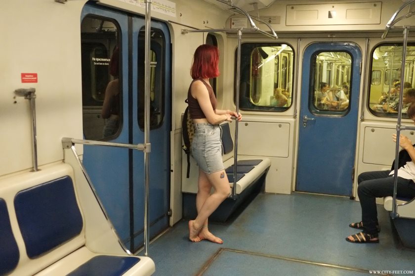 Poster for Tatiana - Clips4Sale Production - A Redhead In A Short Skirt. Part 3. - Barefoot In City, Barefoot In Metro, Closeups (Городские Ноги Крупные Планы)