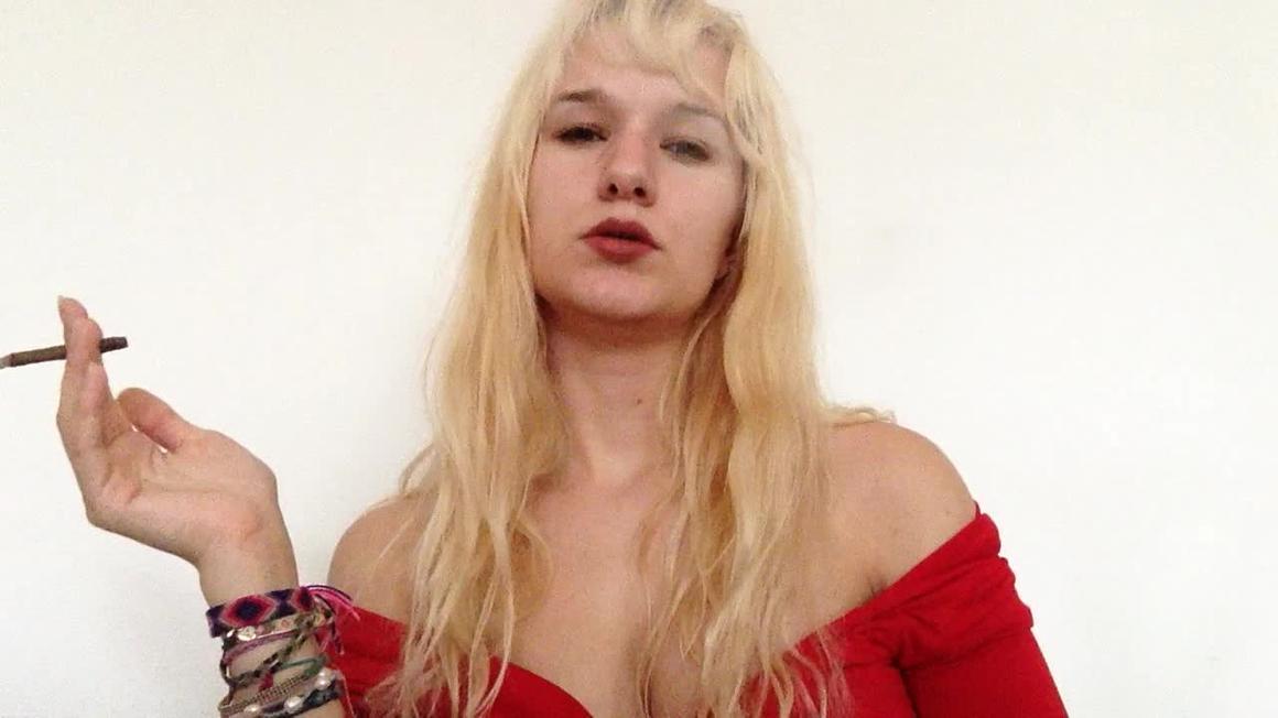 Poster for Goddess Vanessa - Smoking In A Red Dress - Manyvids Star - Blonde, Smoking, Cigar Fetish (Богиня Ванесса Сигарный Фетиш)