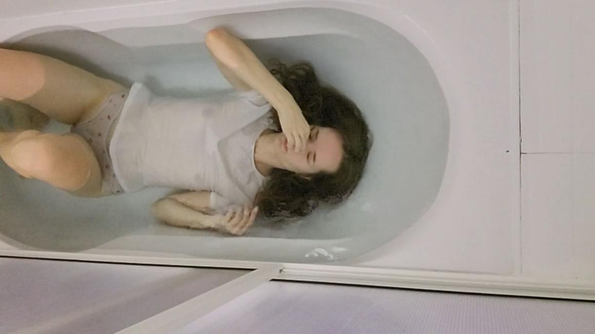 Poster for Manyvids Model - Wet White Tee Underwater - Goddess Vanessa - Bathtub Fetish, Breath Control, Wet T-Shirt (Богиня Ванесса Контроль Дыхания)